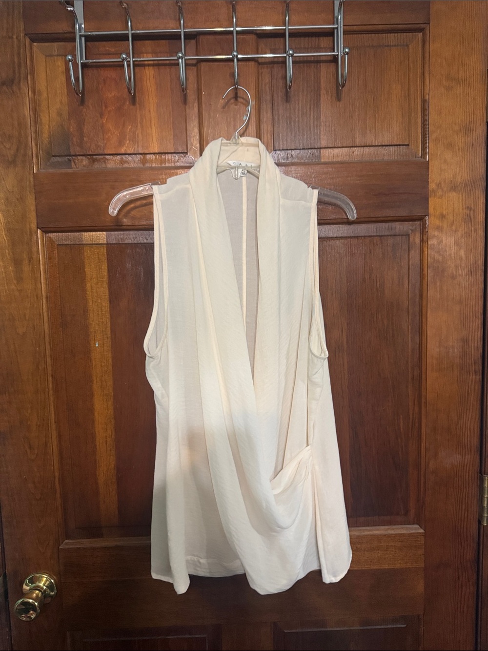 CAbi Sleeveless Draped V-Neck Blouse in Ivory Cream